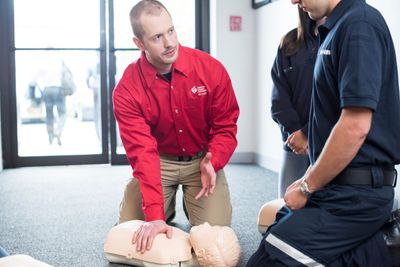 Instructor demonstrating CPR skills