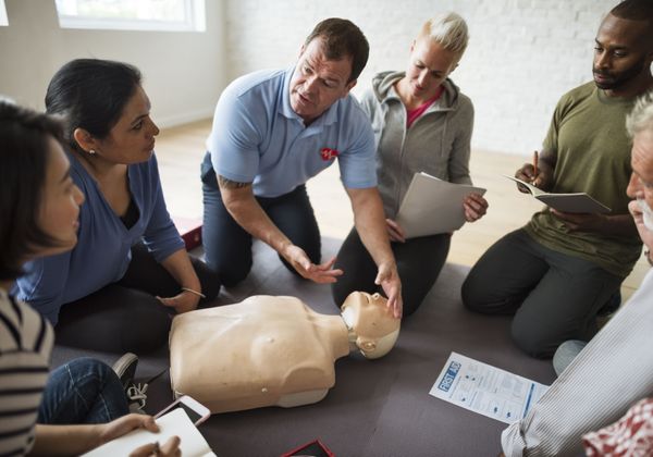 CPR instructor leading hands-on training